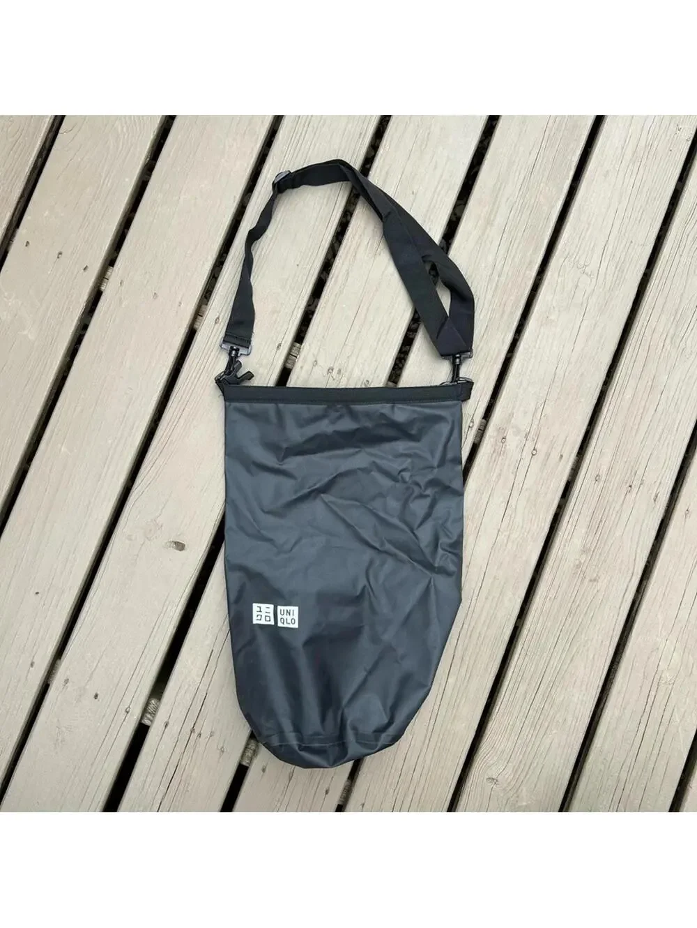 Uniqlo Dry Bag in Black with removable multi position adjustable strap